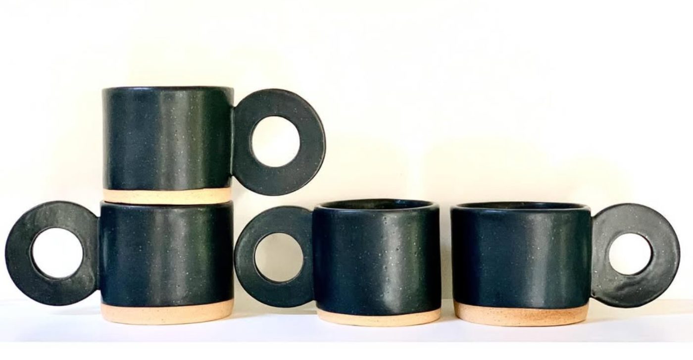 Set of four dark teal circle-handle mugs